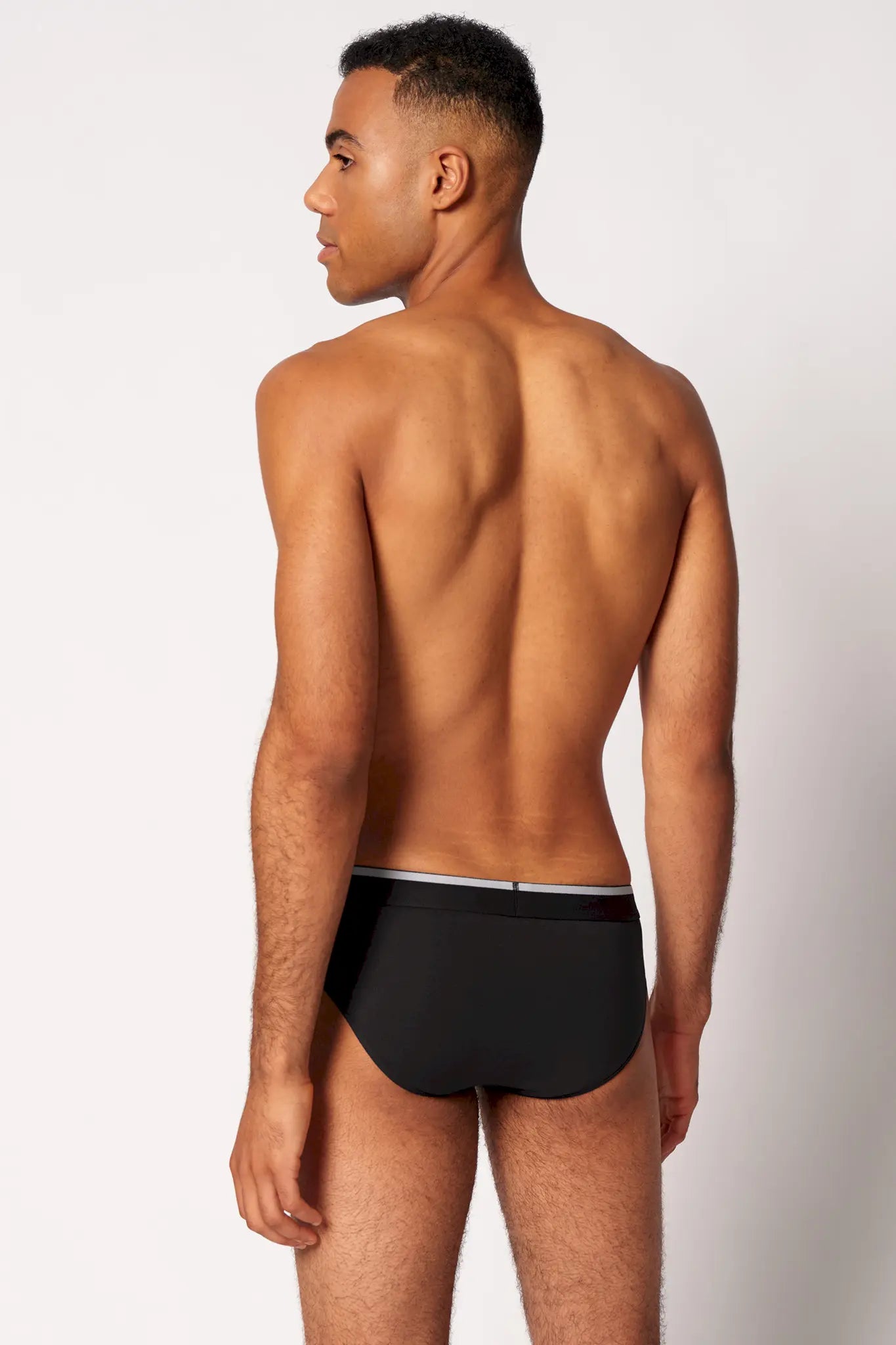Brasil Slip im 3er Pack aus der Männerunterwäsche-Serie COTTON MULTIPACK von der Marke Skiny men, Farbe: black, Rückansicht