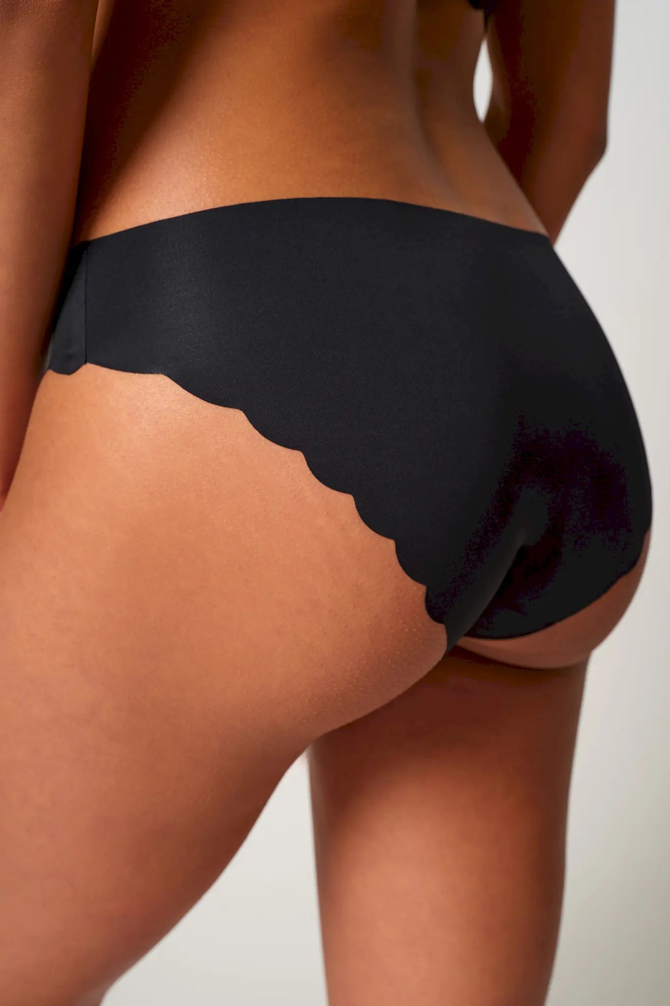 Rio Slip aus der Wäsche-Serie SENSATION von der Marke Skiny, Farbe: black, Rückansicht