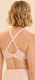 Minimizer-BH mit extra Halt aus der Wäsche-Serie SUBTILE für Damen von der Marke Simone Perele, Farbe: puder, Rückansicht gekreuzt