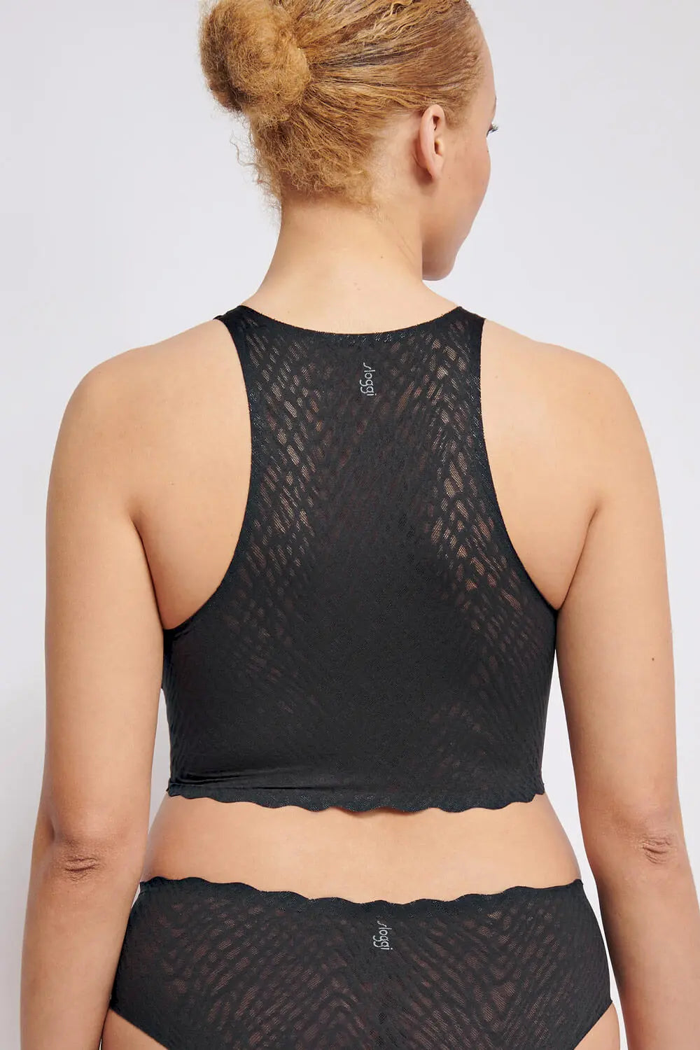 Crop Top aus der romantischen Bodywear-Serie ZERO FEEL BLISS von der Marke Sloggi, Farbe: black, Rückansicht